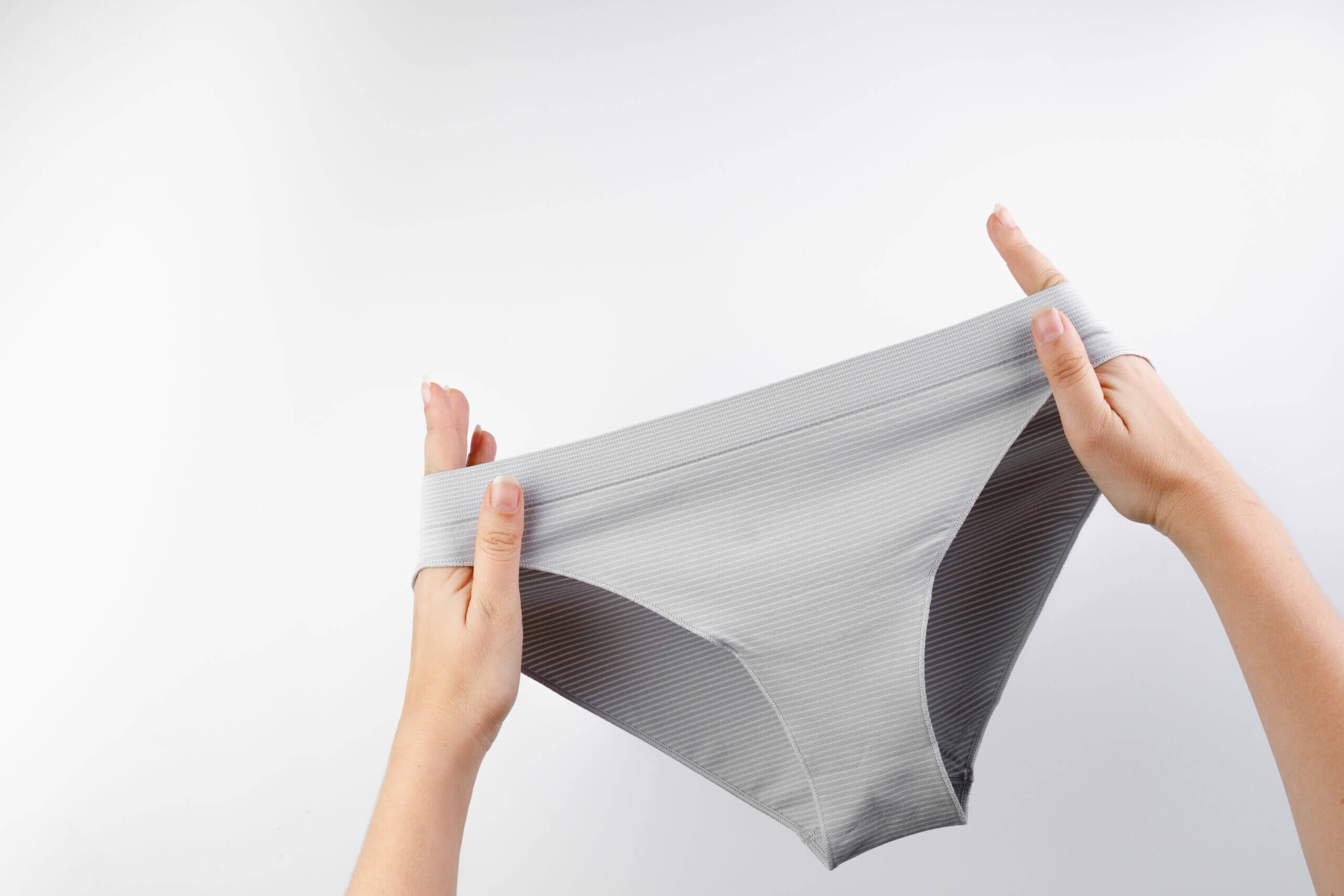 womens panties isolated white background girl holds panties her hands scaled